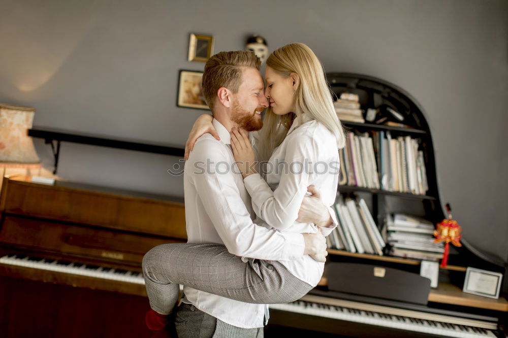 Similar – Image, Stock Photo Lesbian couple kissing in the bathroom of their home