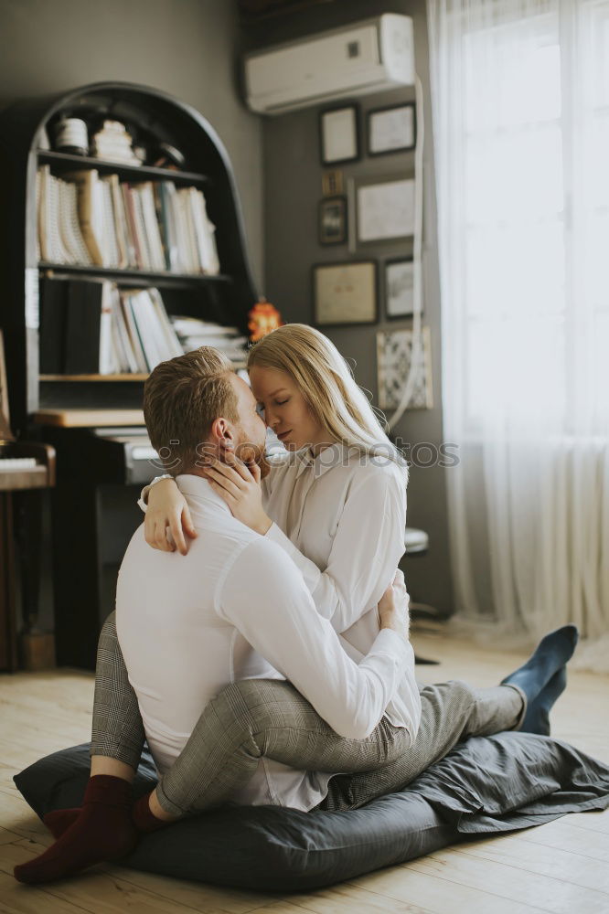 Similar – Image, Stock Photo Couple embracing in car