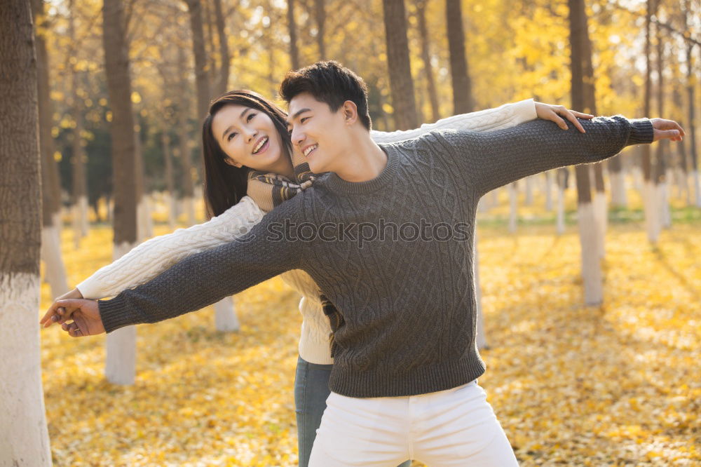 Similar – happy couple having fun in autumn