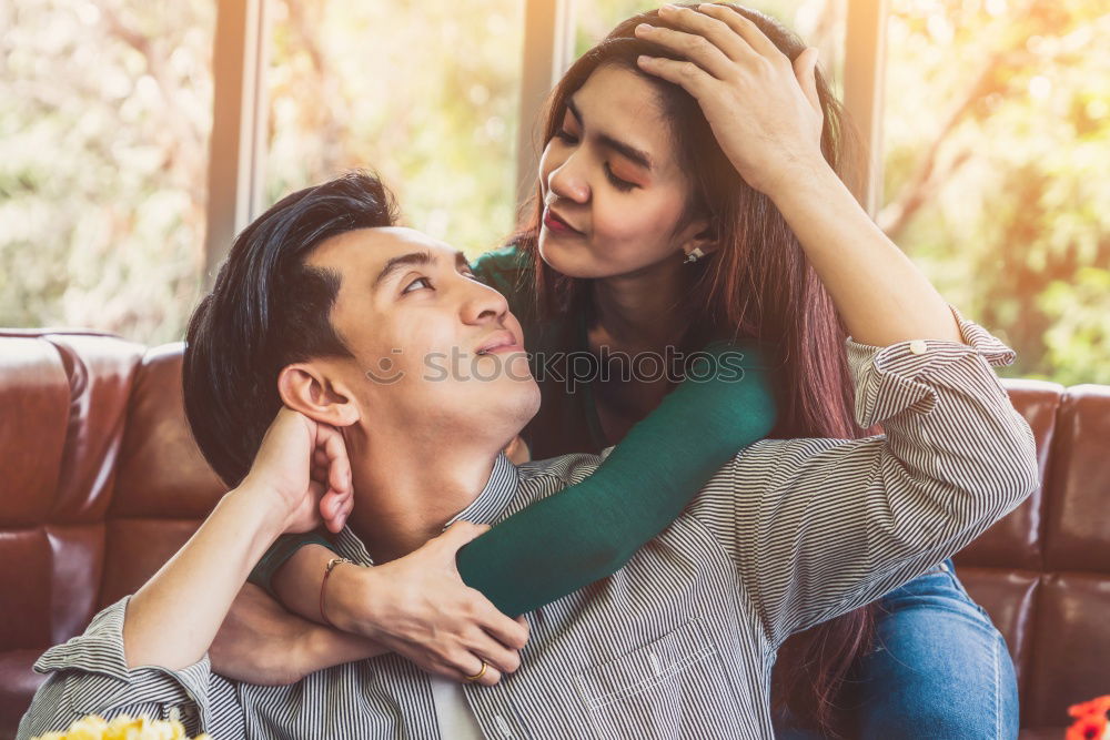 Similar – Image, Stock Photo Mixed Race couple taking funny selfie with phone together