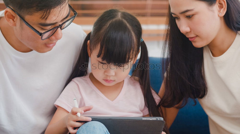 Similar – Image, Stock Photo Mother and her children with digital tablet.