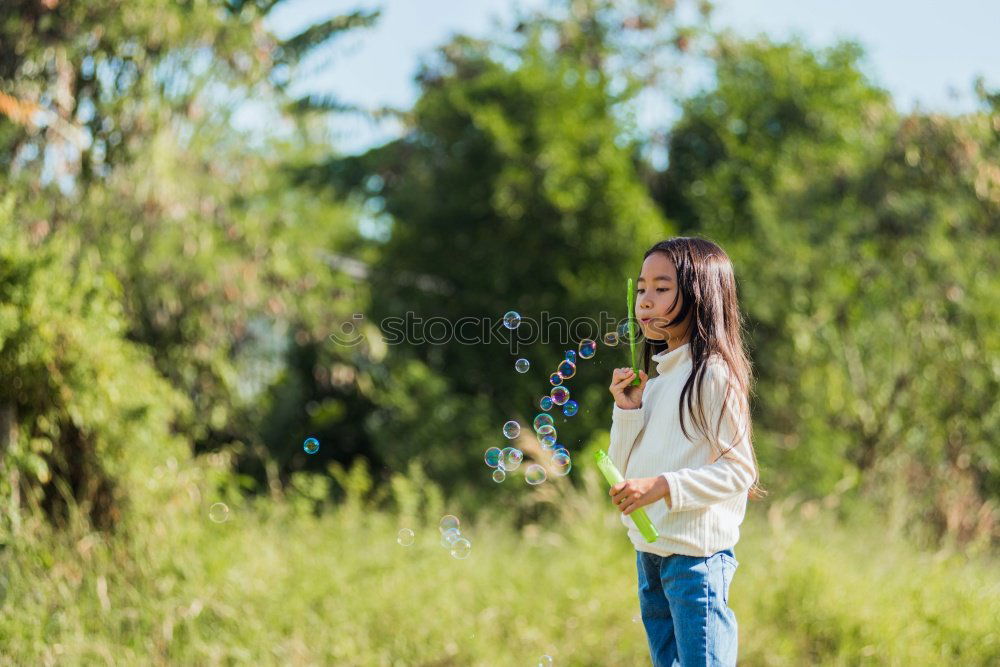 Similar – Image, Stock Photo Young woman is packing her backpack during hiking in summer nature. Concepts of adventure, extreme survival, orienteering. Equipments for hike.