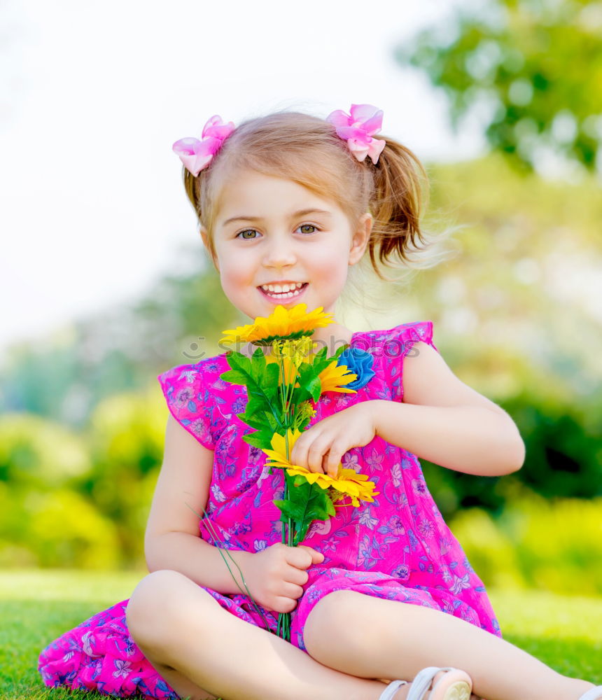 Similar – little girl observing flowers