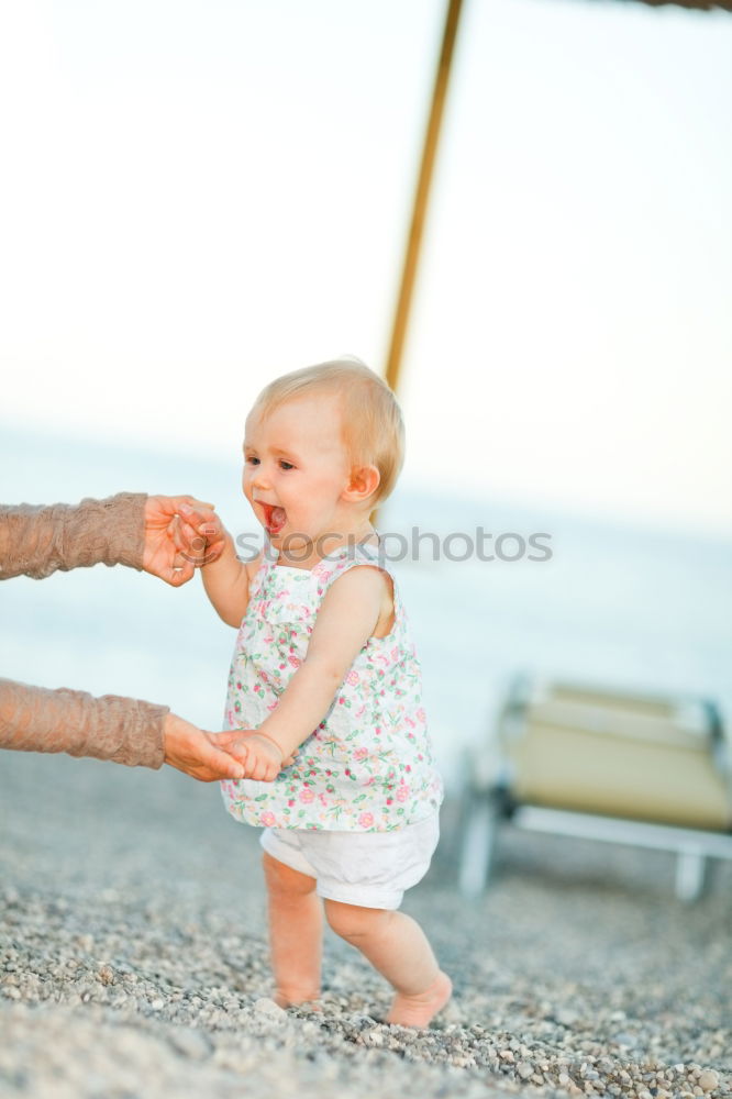 Similar – Image, Stock Photo Father and son playing on the beach at the day time.