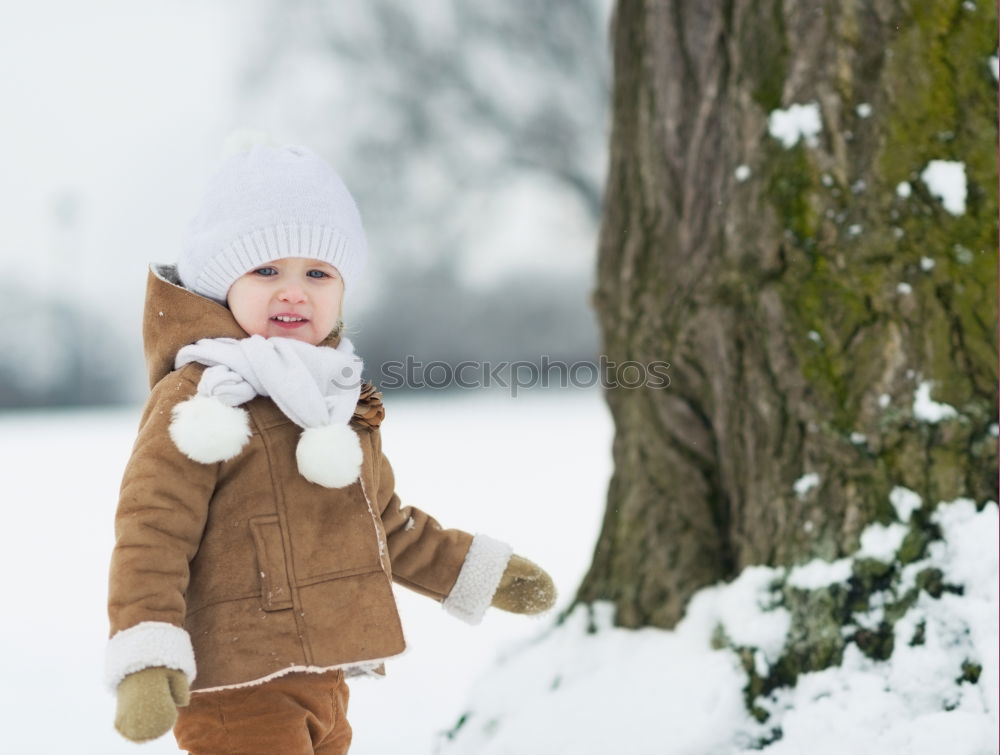 Similar – Family spending time together walking outdoors in winter