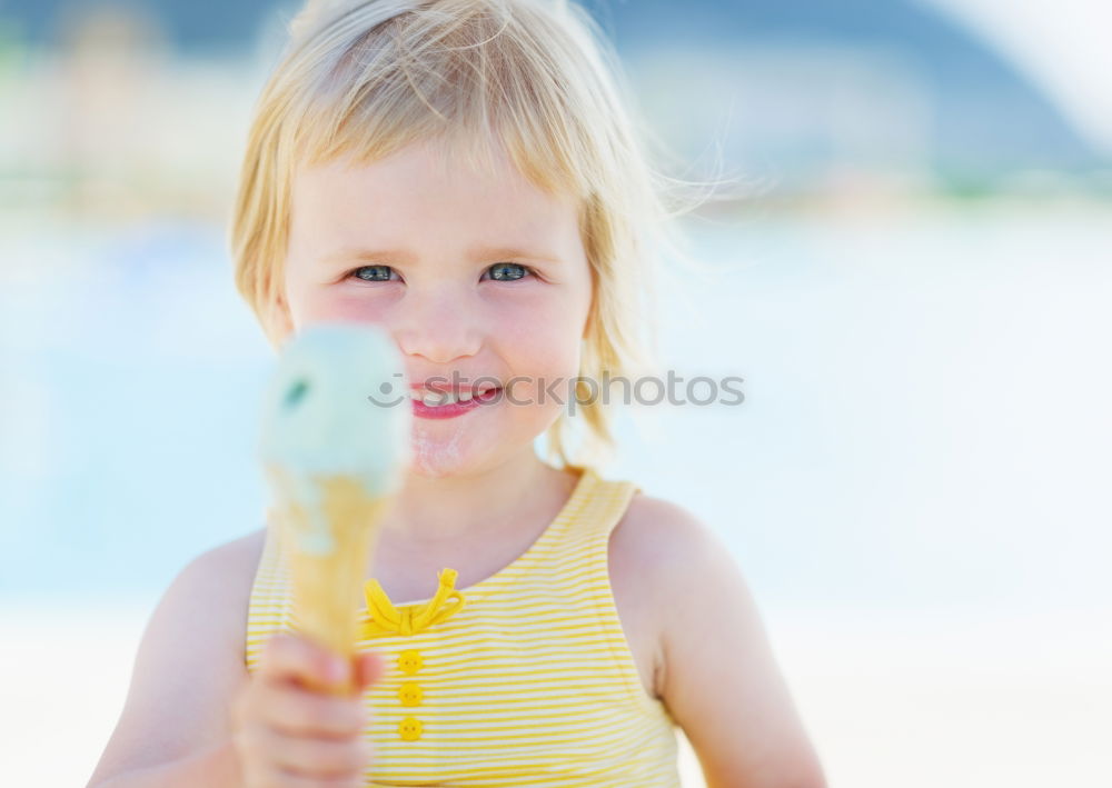 Kid in snorkel mask posing on poolside