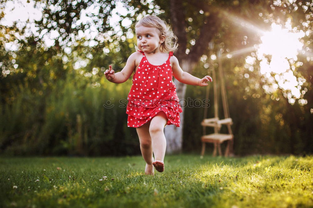 Similar – Image, Stock Photo Adorable child posing happily