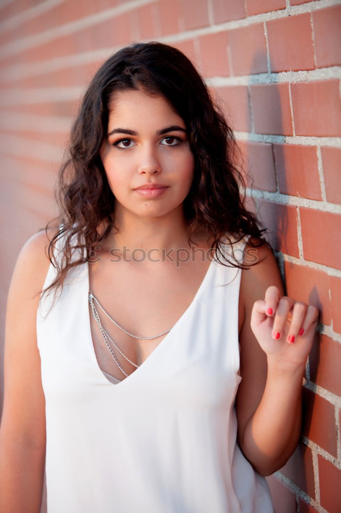 Similar – Image, Stock Photo Portrait of young pretty woman near brick wall