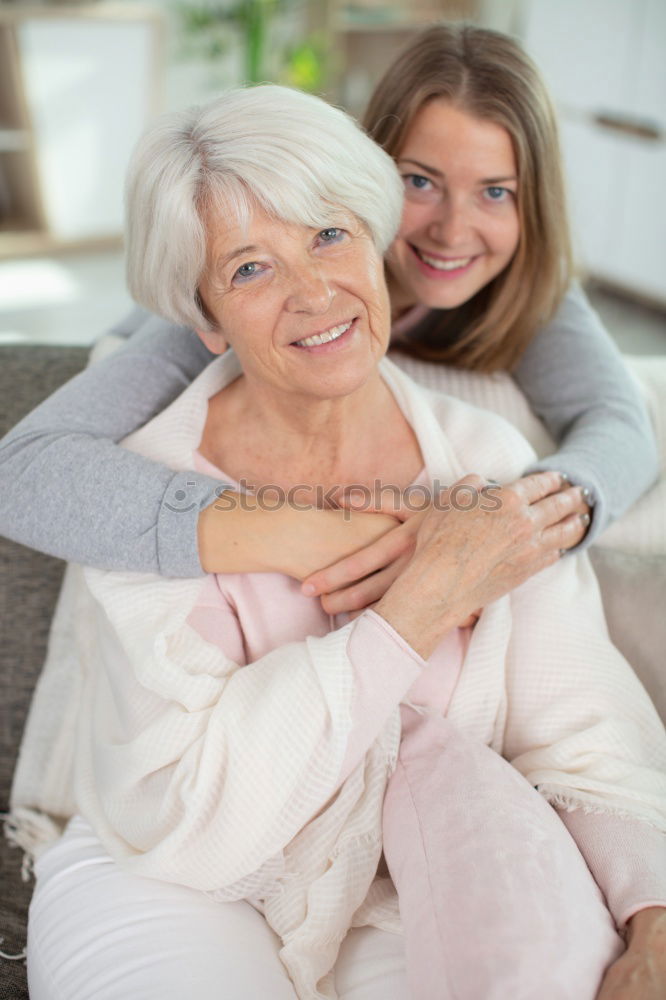 Similar – Image, Stock Photo Female caretaker posing with elderly patient