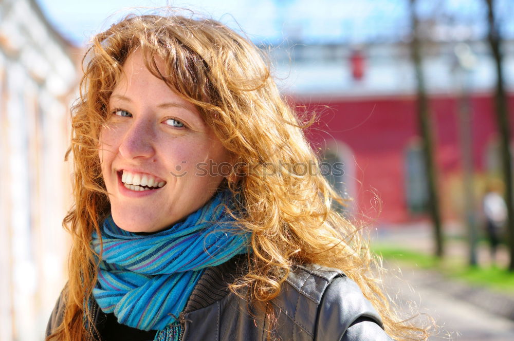 Similar – young beautiful redhead woman with curls and freckles smiles at camera