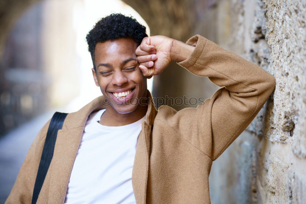 Similar – Young handsome black man holds a ice cream cone