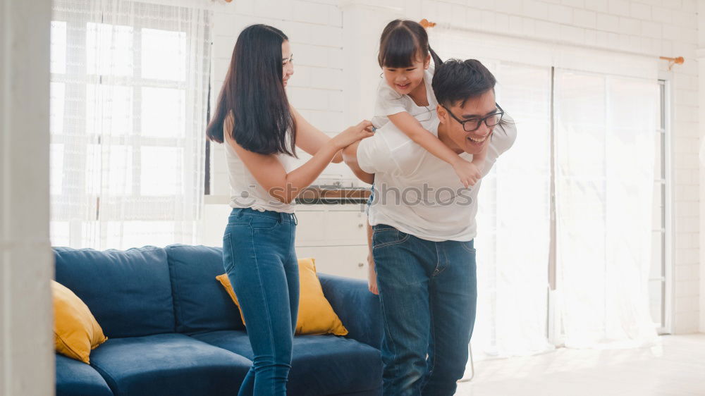 Similar – happy mother and child son playing pillow fight