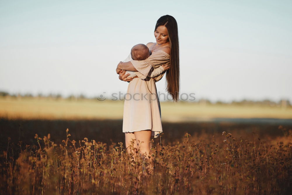 Image, Stock Photo Happy lesbian couple with child