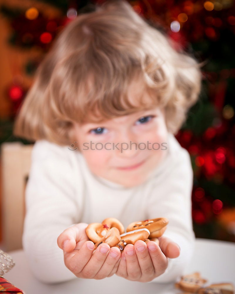 Image, Stock Photo Female hands tying baked Christmas gingerbread with ribbon