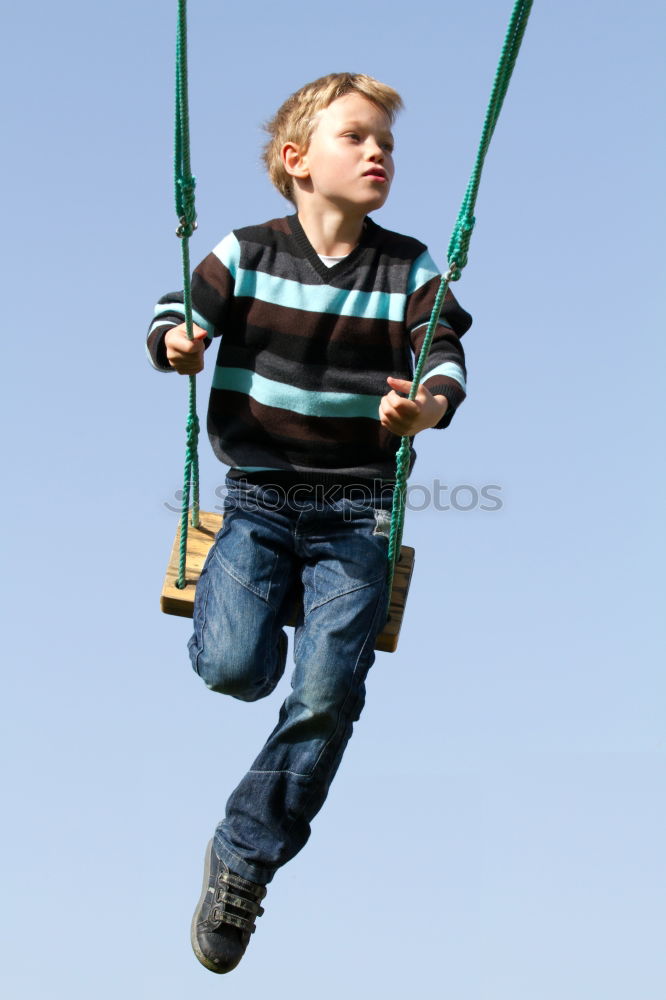 Similar – Boy swings in summer Child