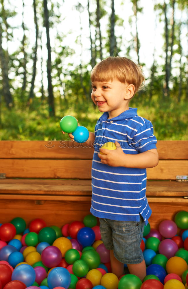 Similar – Image, Stock Photo Happy baby playing with toy blocks.