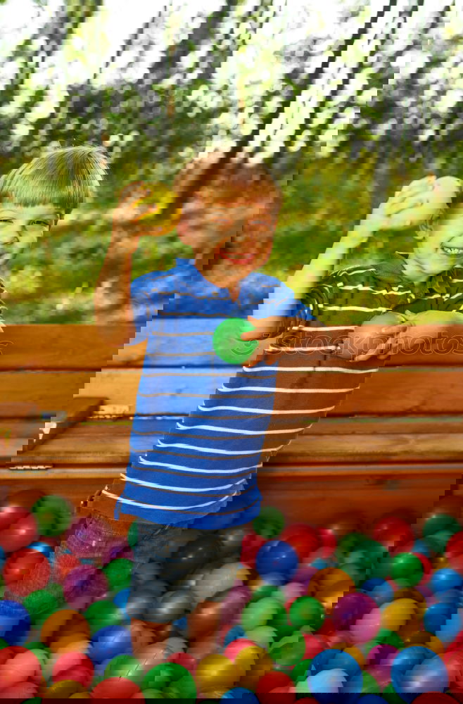 Similar – Image, Stock Photo Child playing in the garden