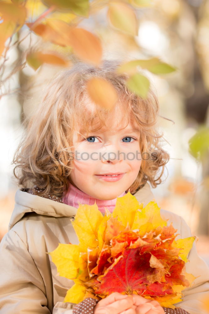 Similar – Image, Stock Photo Girl with bouquet from sheets in autumn