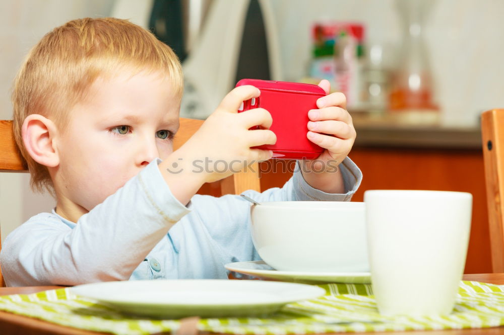 Similar – kid girl drinking hot cocoa at home in winter