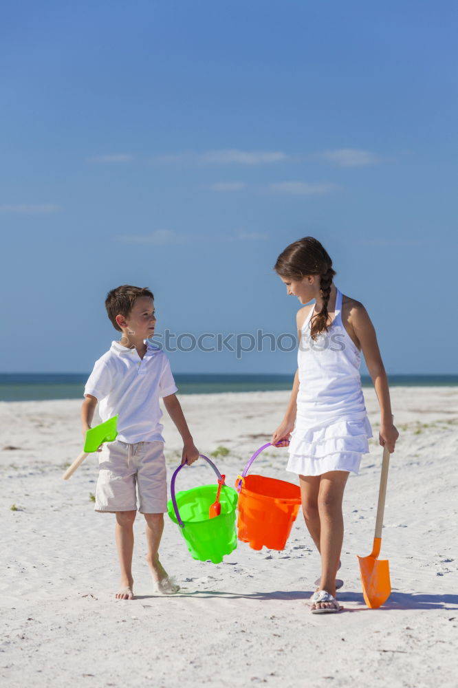 Similar – Image, Stock Photo Two happy children playing on the beach