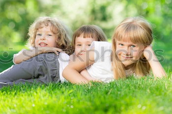 Similar – Image, Stock Photo Three happy children playing in the park at the day time. Concept Brother And Sister Together Forever