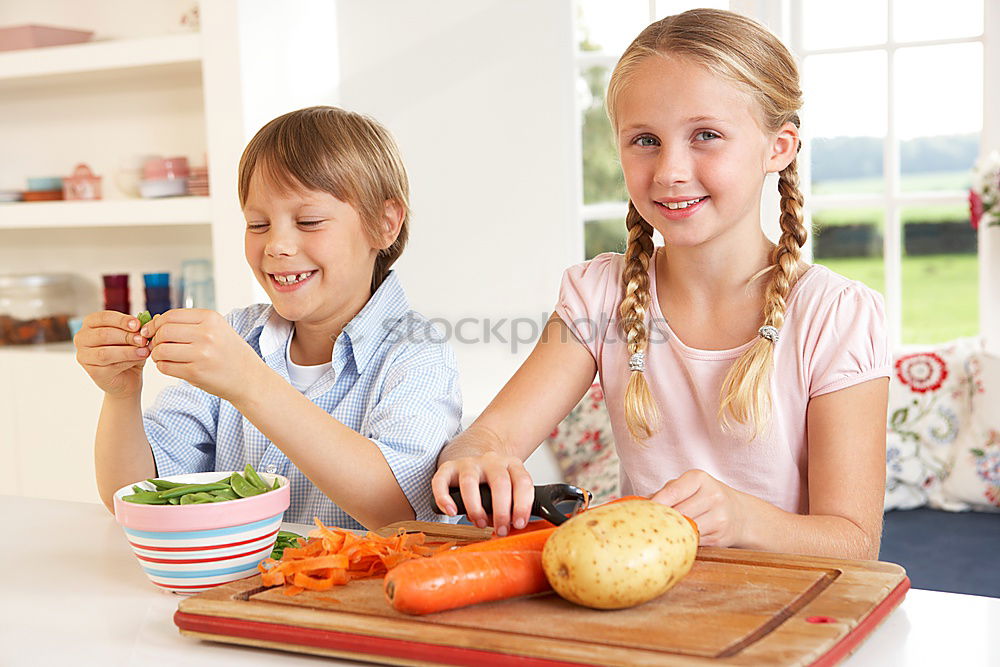 Similar – Image, Stock Photo Little sisters girl preparing baking cookies.