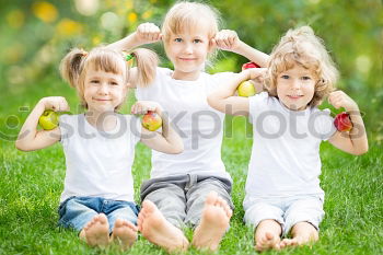 Similar – three happy children Fruit