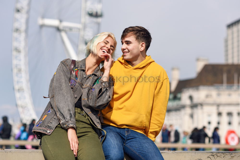 Similar – Image, Stock Photo Happy couple talking sitting near River Thames