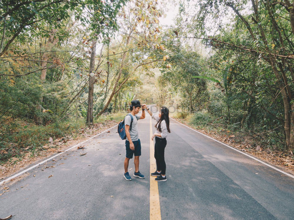 Similar – Image, Stock Photo Coupole holding hands standing on a road