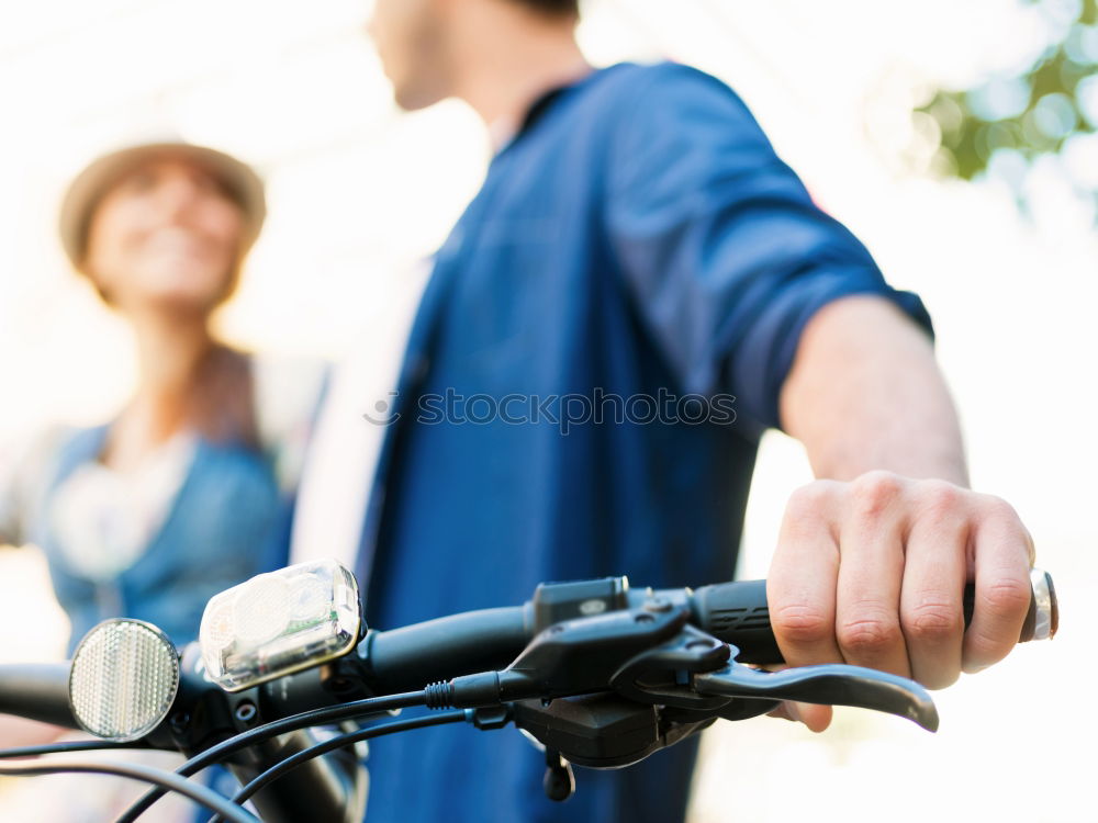 Similar – Young man on bike in the city