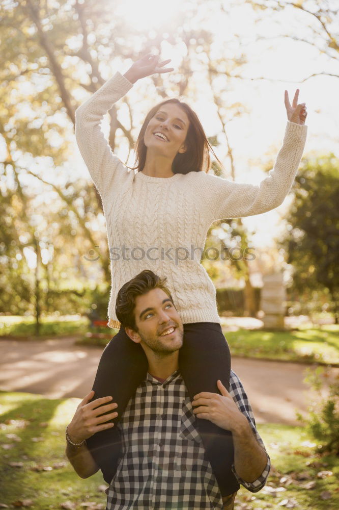 Similar – Smiling couple of lovers having fun.