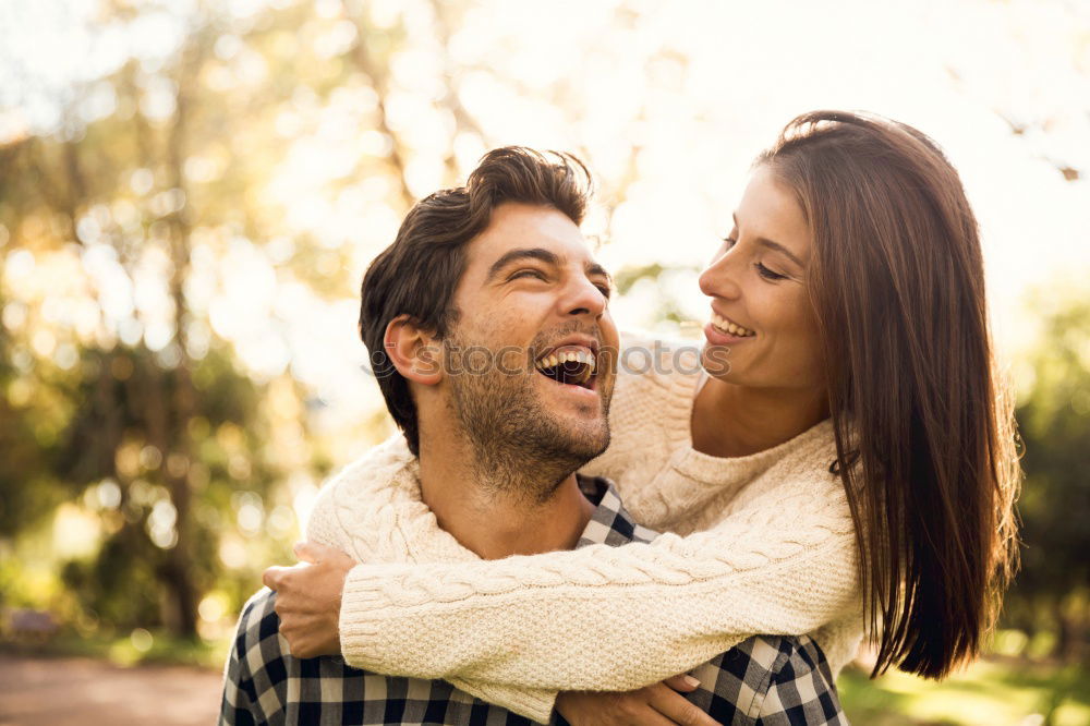 Similar – Image, Stock Photo Smiling couple of lovers having fun.