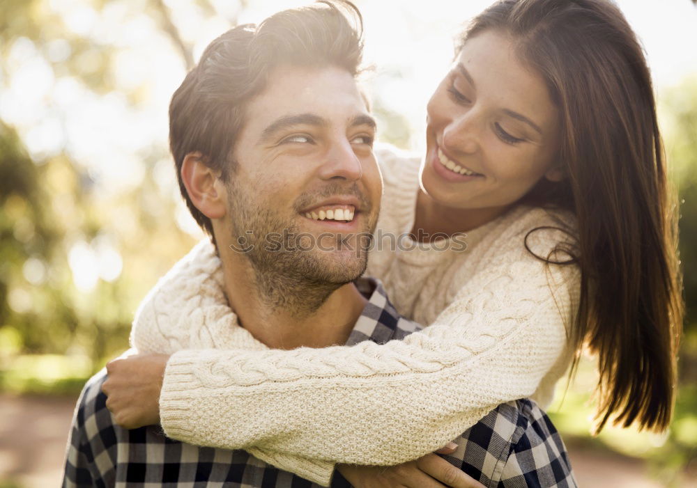 Similar – Image, Stock Photo Smiling couple of lovers having fun.