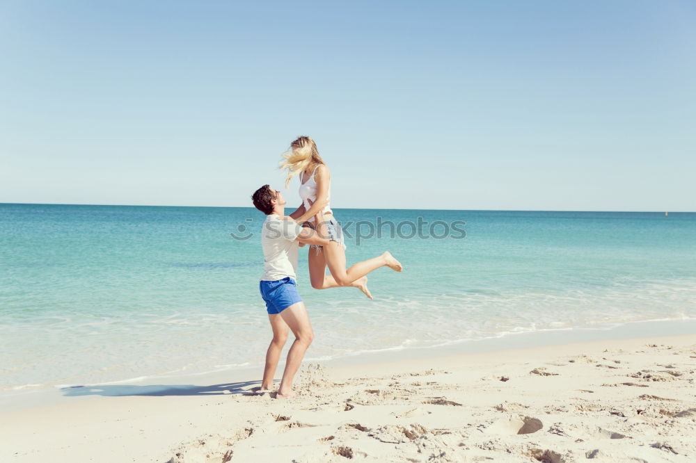 Similar – caucasian mother and son having fun at the beach