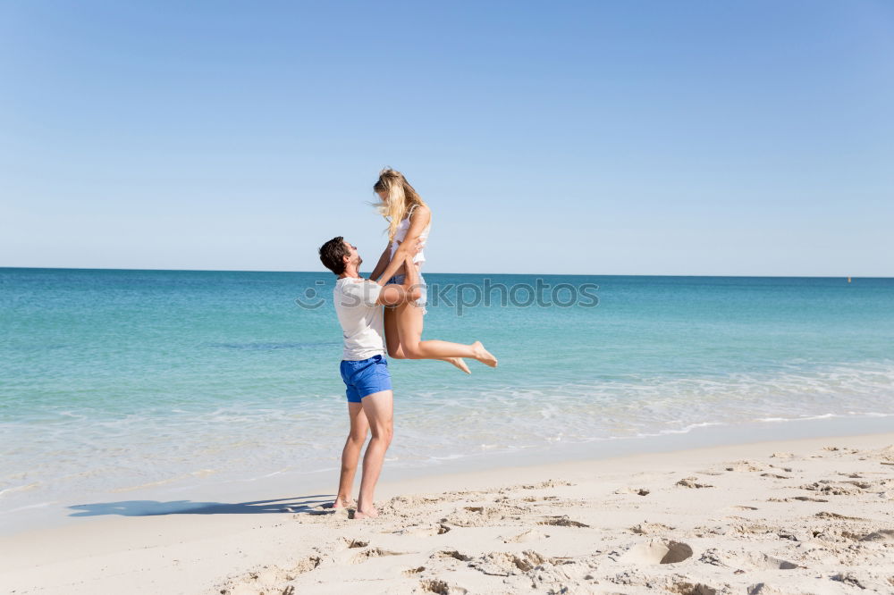 Similar – Image, Stock Photo Mother and son walking on the beach together