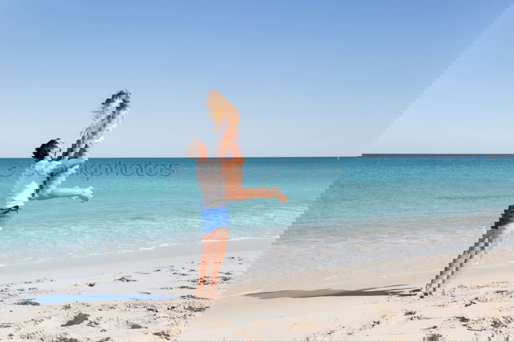 Similar – Image, Stock Photo Happy children playing on the beach at the day time.