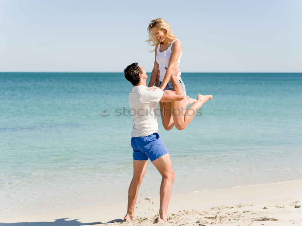 Similar – Father and son playing on the beach at the day time.