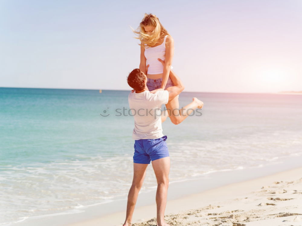 Similar – Image, Stock Photo Father and son playing on the beach at the day time. They are dressed in sailor’s vests and pirate costumes. Concept of happy game on vacation and friendly family.