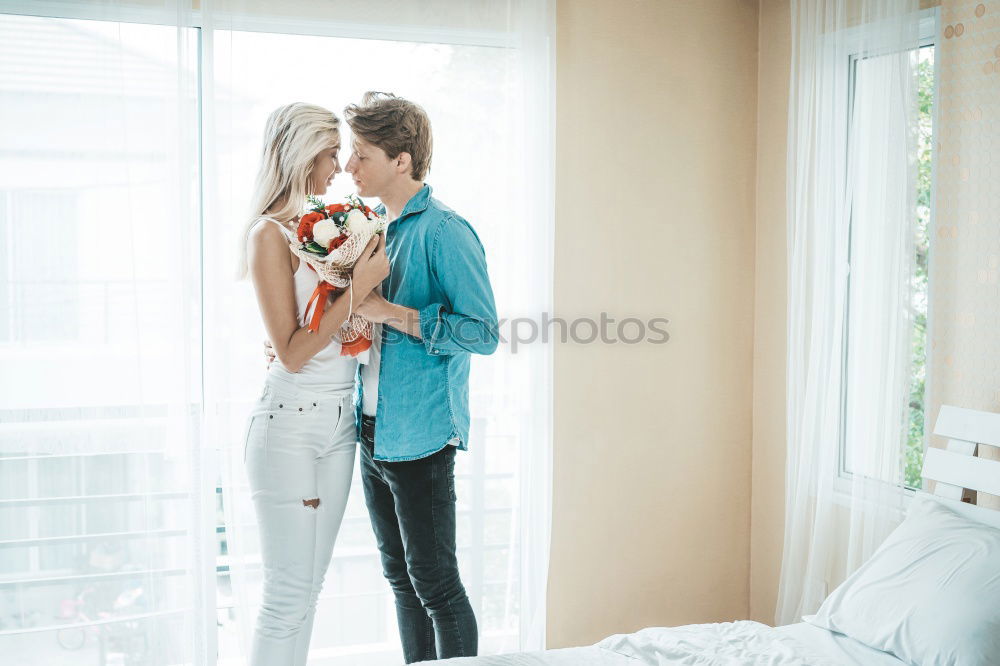 Image, Stock Photo Lesbian couple kissing in the bathroom of their home