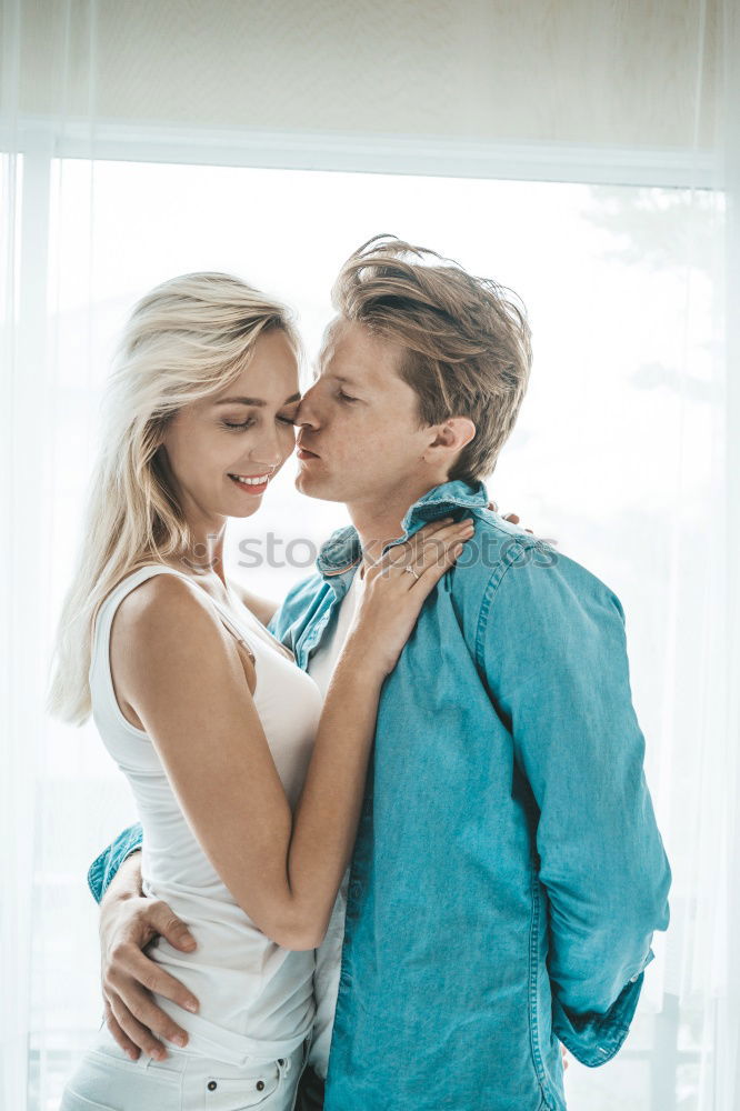 Similar – Image, Stock Photo Two loving sisters comforting each other hugging each other in a close embrace as they stand outdoors in the countryside