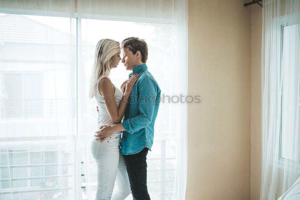 Similar – Image, Stock Photo Lesbian couple kissing in the bathroom of their home