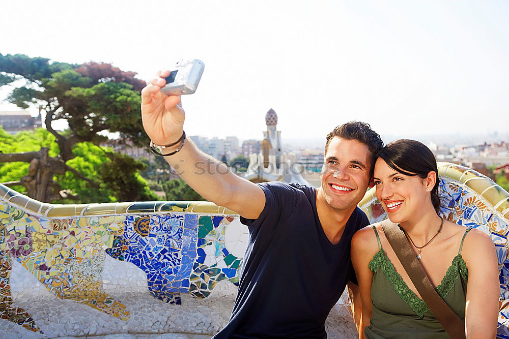 Similar – Image, Stock Photo Cheerful friends taking photos of themselves on smart phone