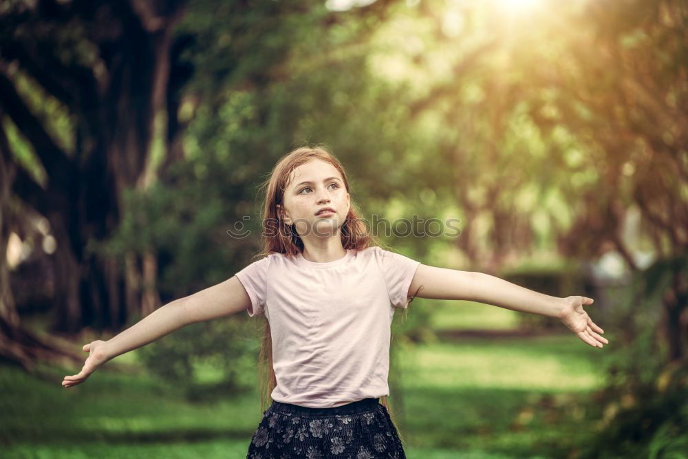 Similar – Image, Stock Photo woman serious points sunset