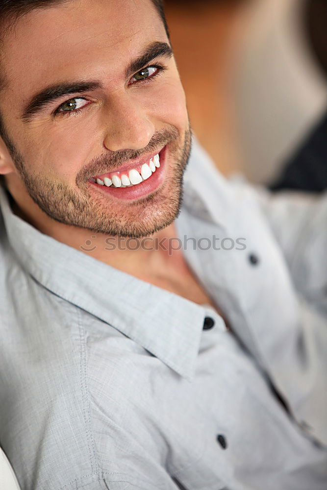 Similar – Young man smiling in urban background