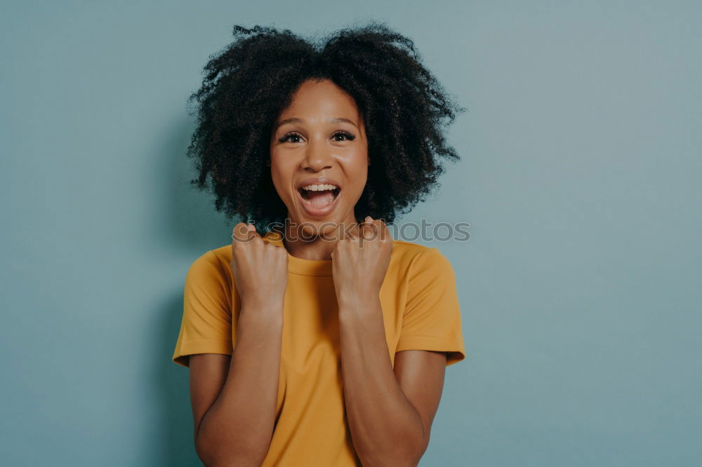 Similar – close up of a pretty black woman with curly hair smelling a rose flower sit on bed