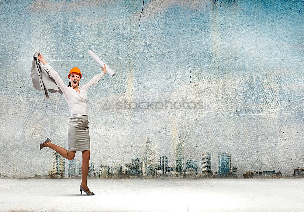 Similar – elegantly dressed lady with black coat, red hat, red scarf and red pumps is dancing on a large square with concrete and patterned floor