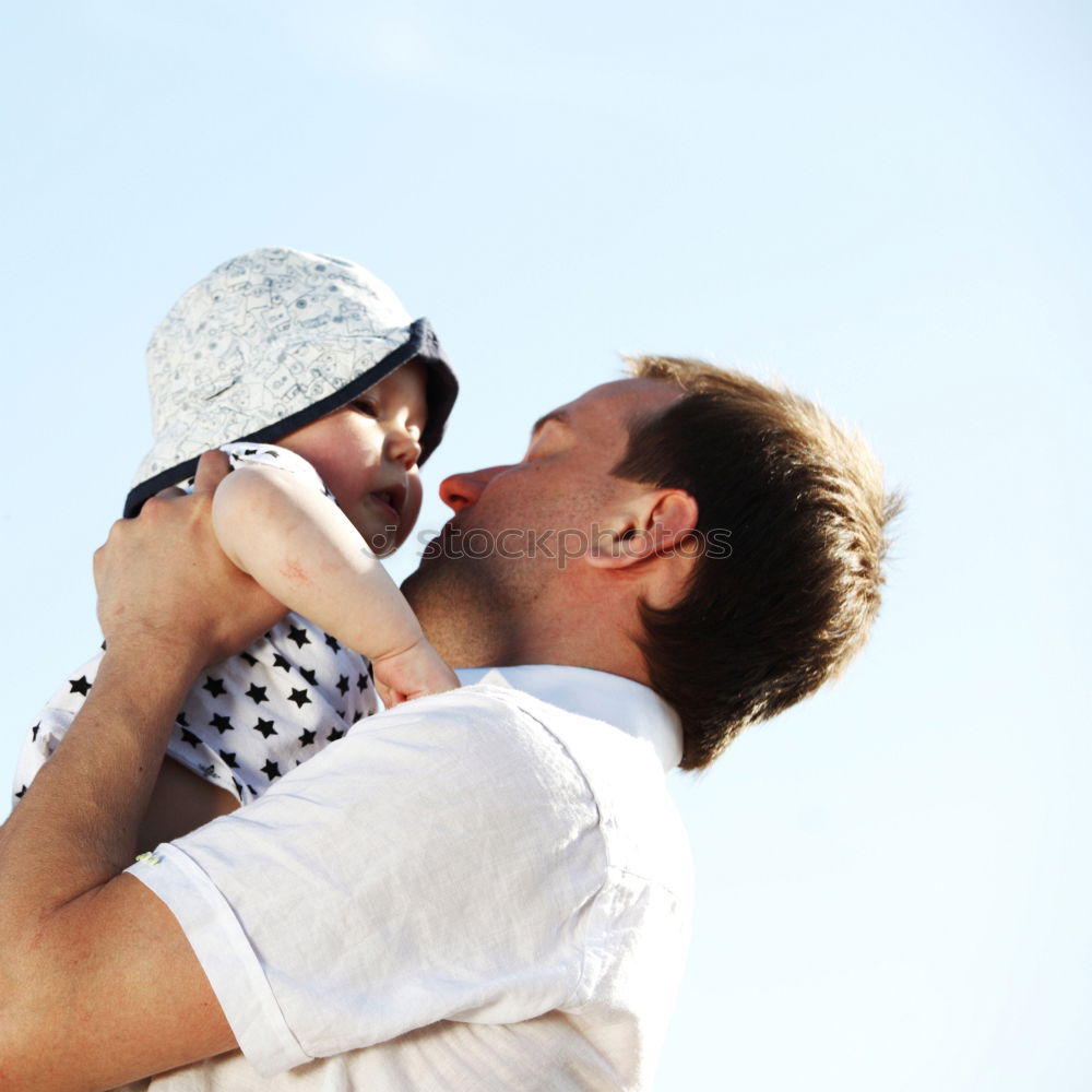 Similar – Image, Stock Photo Father and son playing on the beach at the day time.