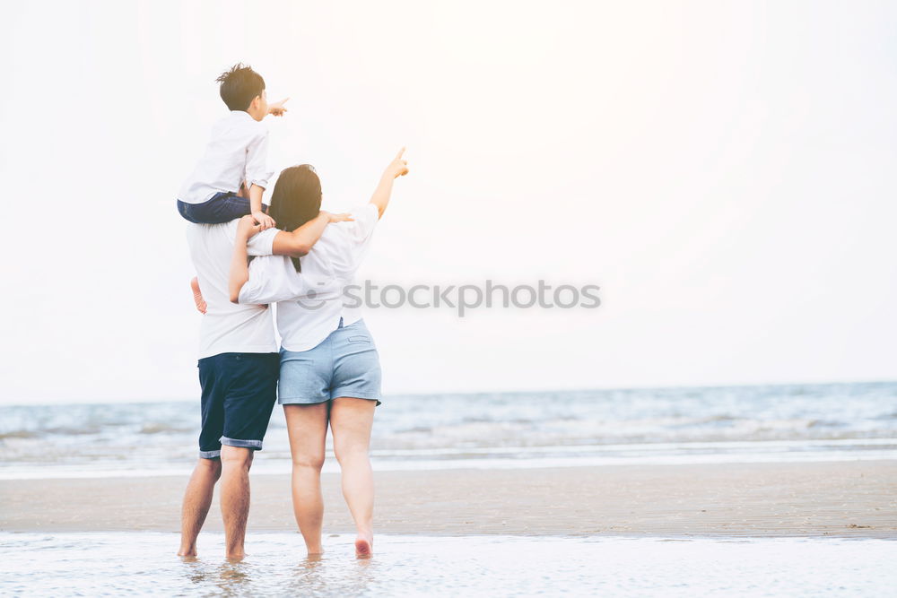 Similar – Person on cliff taking photo