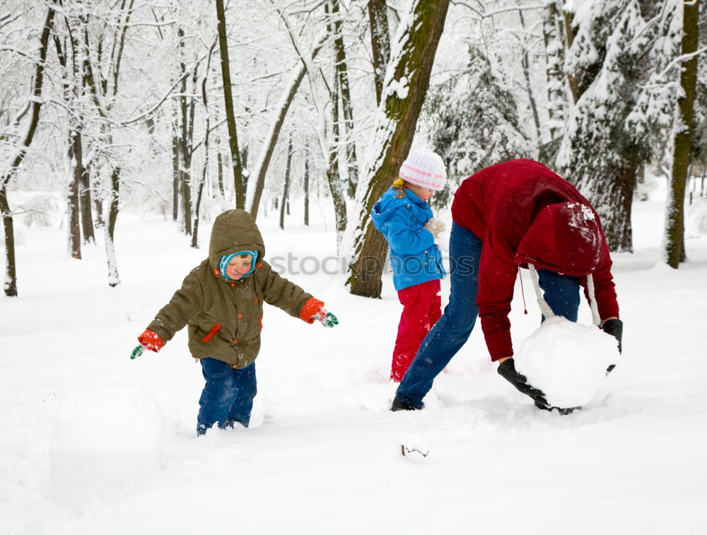 Similar – Family spending time together walking outdoors in winter