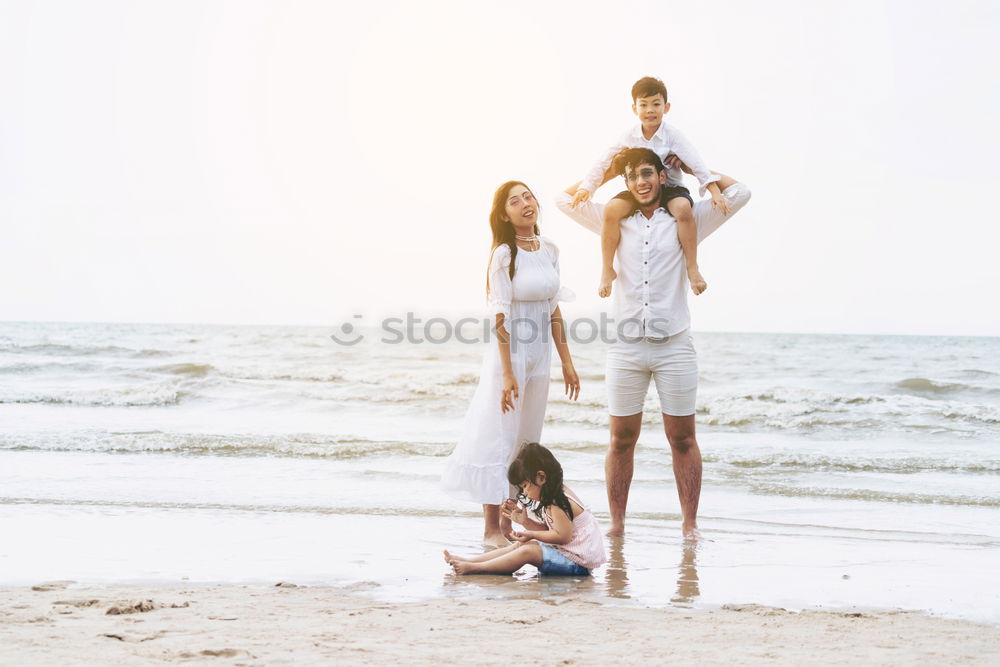 Similar – Image, Stock Photo Group of friends hanging out at beach in summer